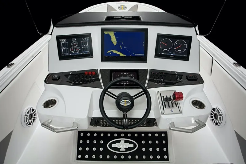 Slide: The Image of 2025 Cigarette 39 GTS boat dashboard with advanced navigation and control systems. - 9