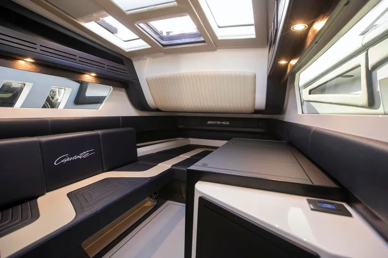 Slide: The Image of Interior of 2025 Cigarette 59 Tirranna luxury boat with modern seating and skylights. - 12