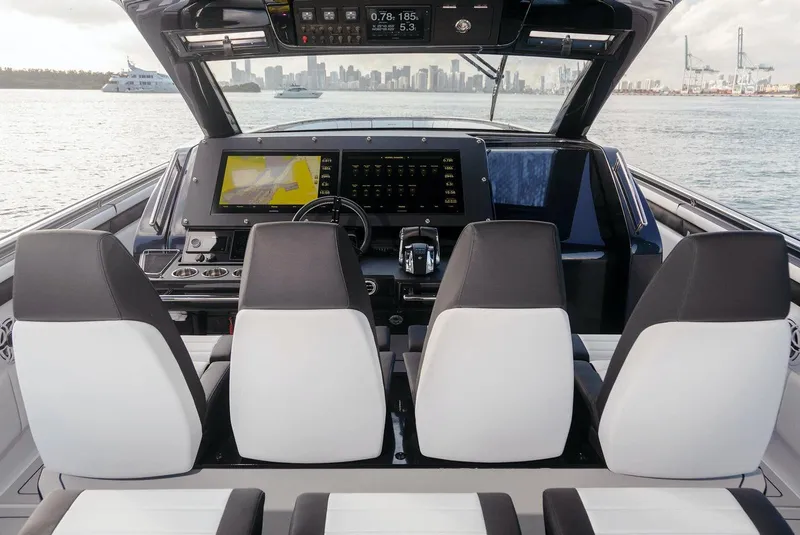 Slide: The Image of Interior cockpit of 2025 Cigarette 59 Tirranna boat with modern navigation system. - 7