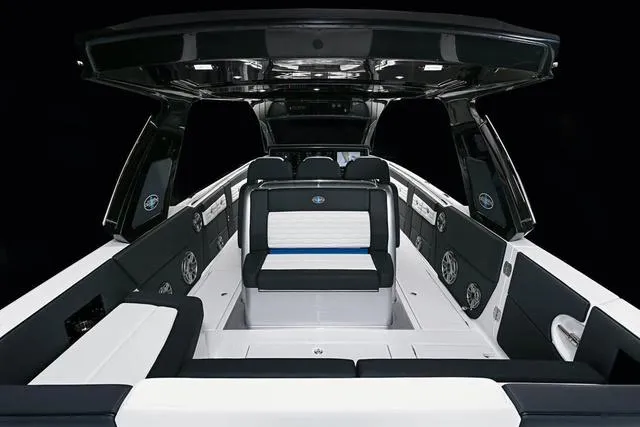 Slide: The Image of 2025 Cigarette 41 Nighthawk boat interior with black and white seating. - 12