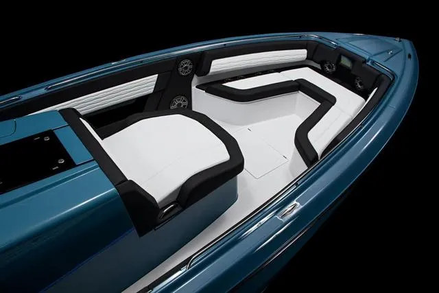 Slide: The Image of 2025 Cigarette 41 Nighthawk boat interior with white and black seating. - 7