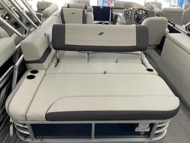 Slide: The Image of 2023 Starcraft EX 22 Q pontoon boat interior with spacious seating. - 18