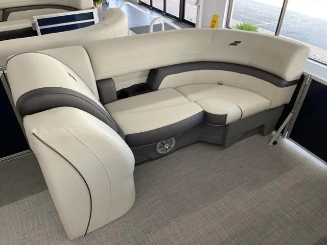 Slide: The Image of 2023 Starcraft EX 22 Q boat interior with luxurious seating. - 5