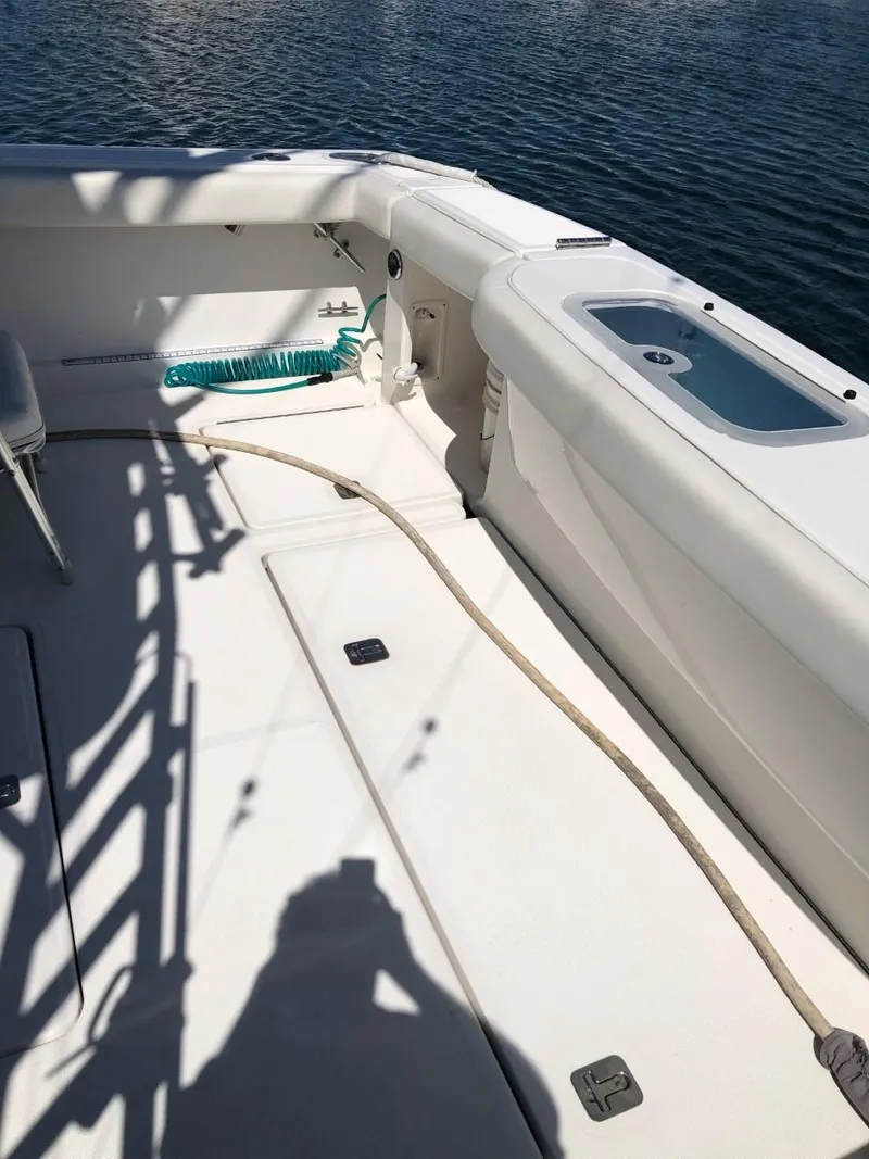 Slide: The Image of 2006 Tiara Yachts 3800 Open deck with seating and water view. - 10