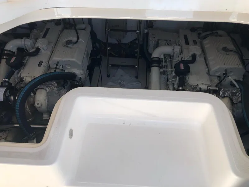 Slide: The Image of Engine compartment of a 2006 Tiara Yachts 3800 Open, showcasing dual engines. - 27