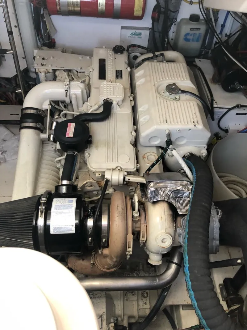 Slide: The Image of Engine compartment of a 2006 Tiara Yachts 3800 Open, showcasing detailed machinery. - 28