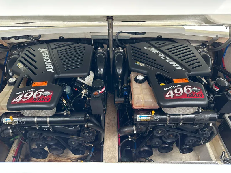 Slide: The Image of Twin Mercury 496 MAG engines in a 2003 Formula 330 Sun Sport boat. - 16