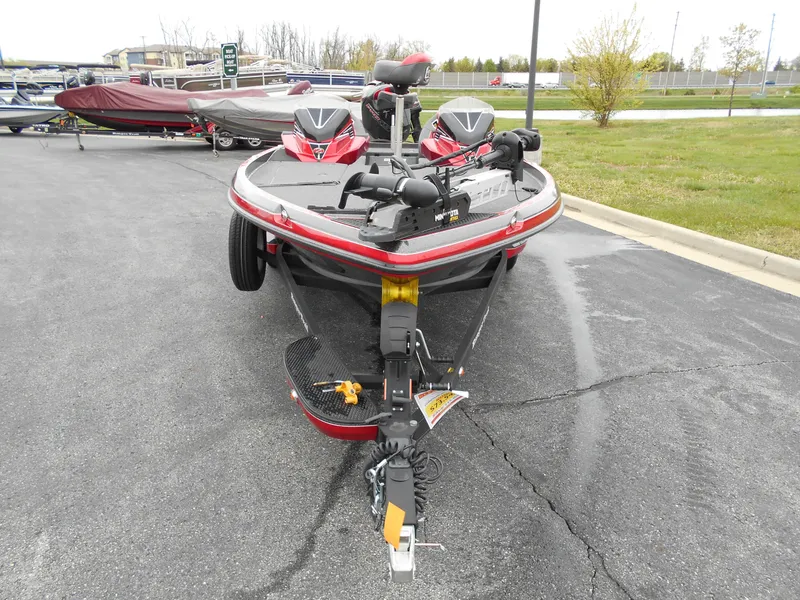 Slide: The Image of 2023 Ranger Z520R bass boat on a trailer, parked in a lot. - 3