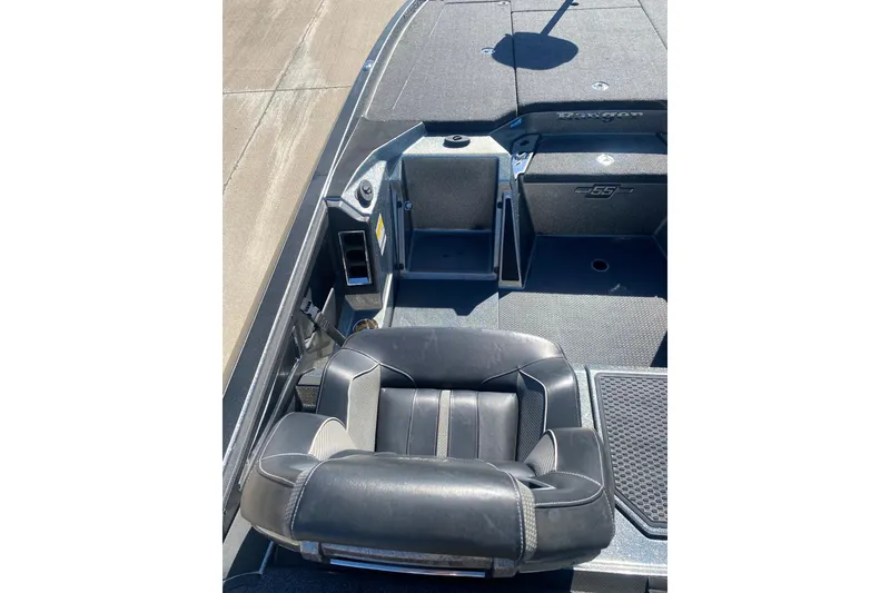 Slide: The Image of 2023 Ranger Z520R boat cockpit with steering wheel and control panel. - 10