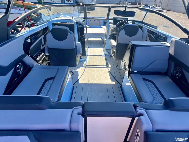 Slide: The Image of 2025 Yamaha Boats 255XD interior with modern seating and sleek design. - 3