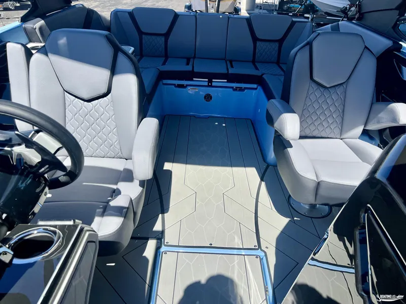 Slide: The Image of 2025 Yamaha Boats 255XD interior with modern seating and sleek design. - 7