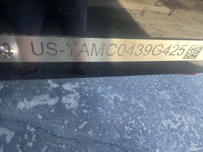 Slide: The Image of Yamaha Boats 255XD 2025 hull identification number on metal plate. - 9