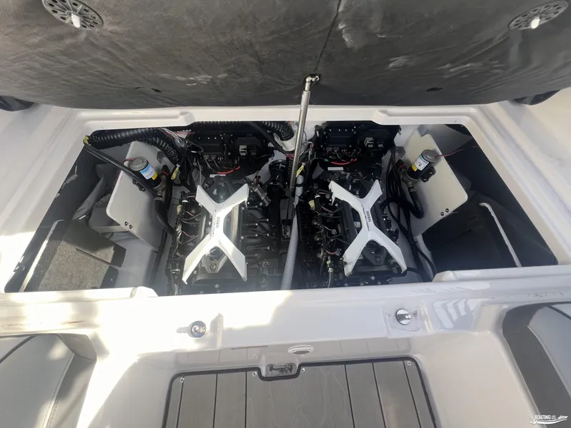 Slide: The Image of 2025 Yamaha Boats 252XE engine compartment, showcasing dual engines and clean layout. - 9