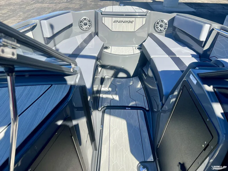 Slide: The Image of 2025 Yamaha Boats 222XE interior with sleek seating and modern design. - 5