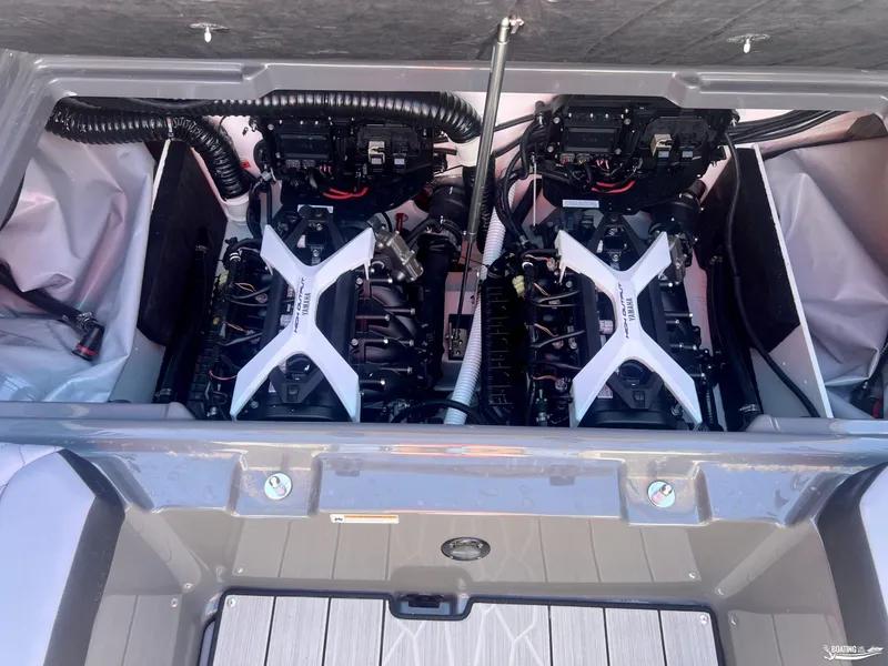 Slide: The Image of 2025 Yamaha Boats 222XE engine compartment with dual engines and advanced components. - 8