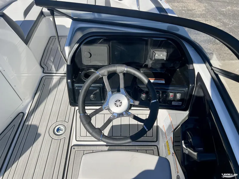 Slide: The Image of 2025 Yamaha Boats 195S steering console with modern controls and sleek design. - 5