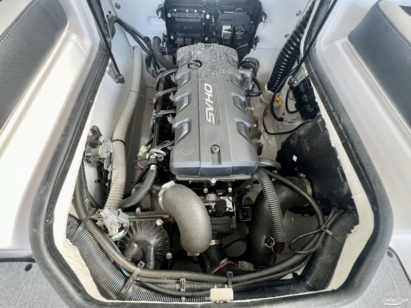 Slide: The Image of 2024 Yamaha SX195 engine compartment showcasing SVHO engine components. - 10