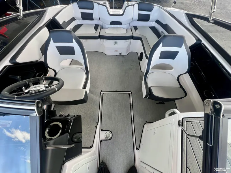 Slide: The Image of 2024 Yamaha Boats SX195 interior with modern seating and steering wheel. - 4