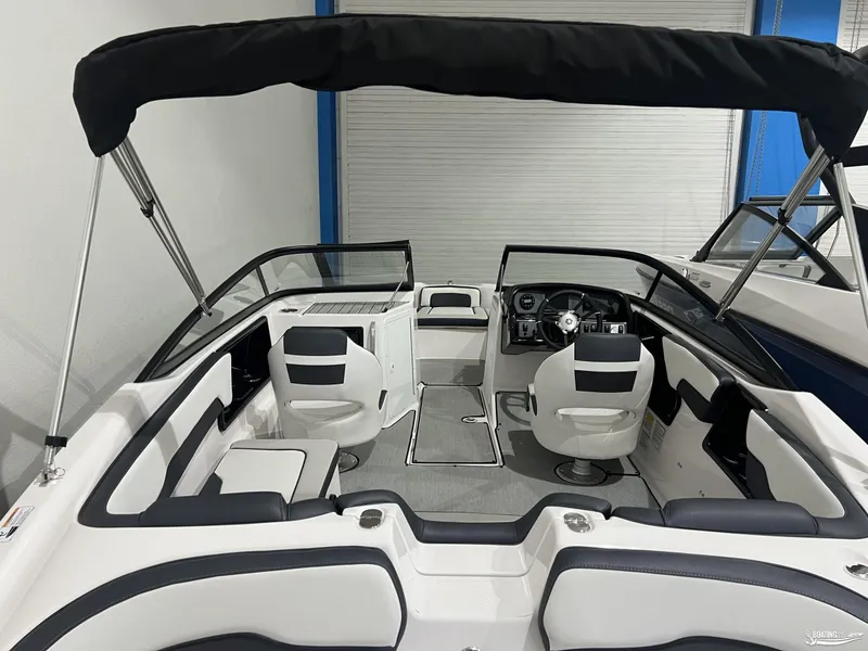 Slide: The Image of 2024 Yamaha Boats SX195 interior with seating and steering wheel, featuring modern design and comfort. - 6