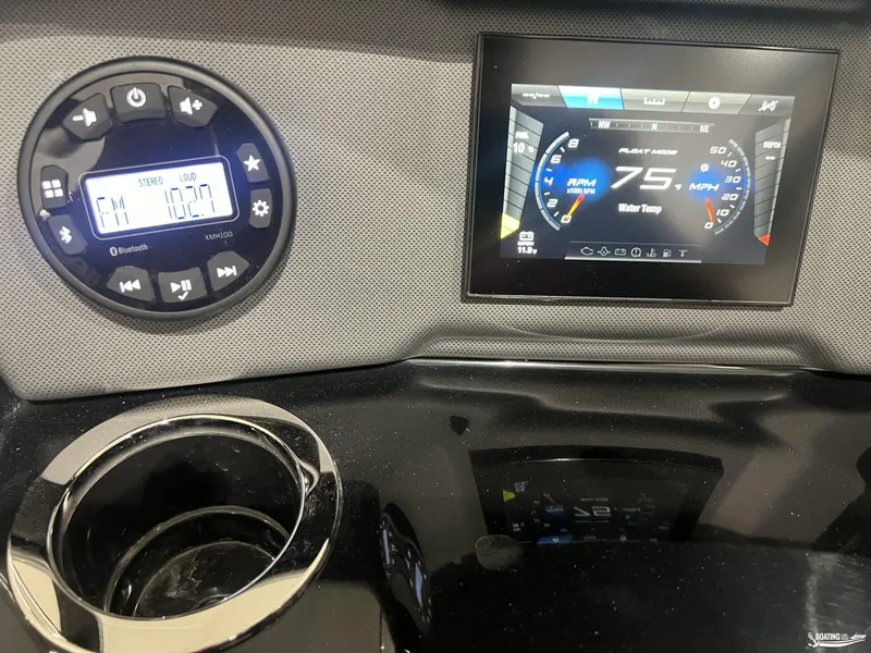Slide: The Image of 2024 Yamaha SX195 dashboard with digital display and stereo controls. - 7