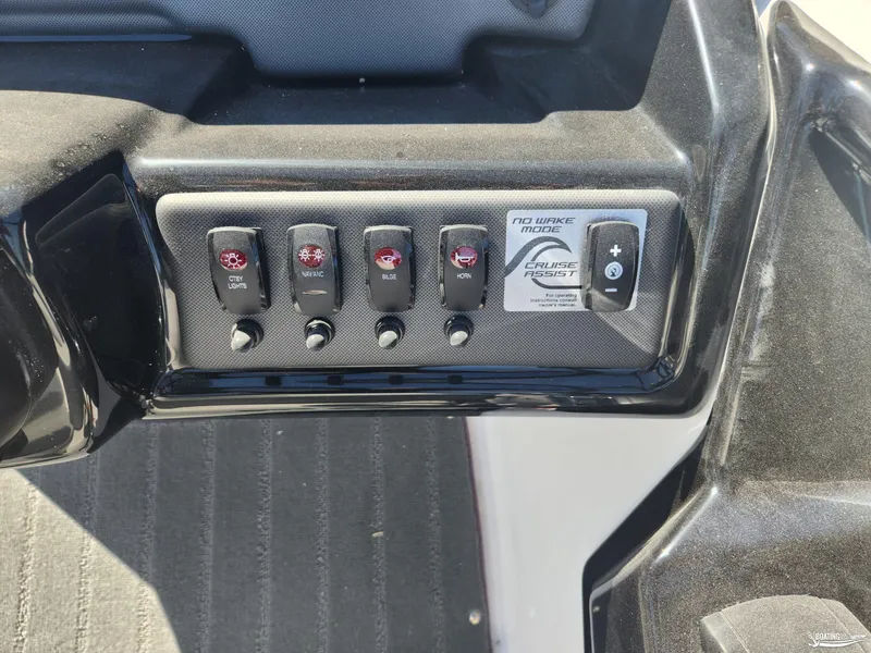 Slide: The Image of Control panel of 2025 Yamaha Boats SX190 with various switches and cruise assist feature. - 6