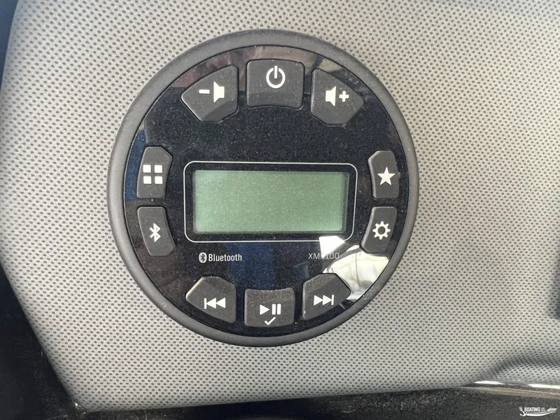 Slide: The Image of Yamaha Boats SX190 2025 dashboard control panel with Bluetooth and audio settings. - 7