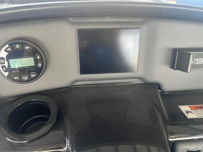 Slide: The Image of 2025 Yamaha SX190 boat dashboard with control panel and display screen. - 8