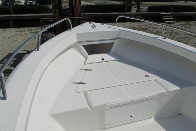 Slide: The Image of 2023 May-Craft 1900CC boat bow with storage compartments and railings. - 15