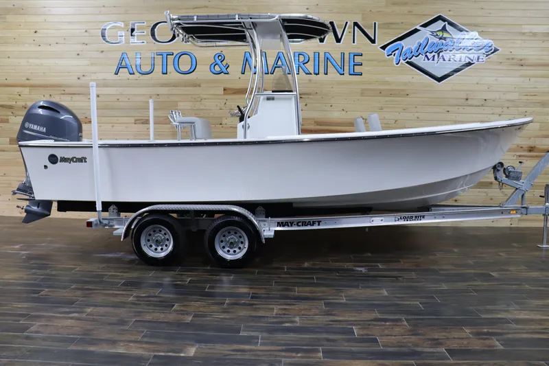 Slide: The Image of 2023 May-Craft 23 Cape Classic boat on trailer at dealership. - 1