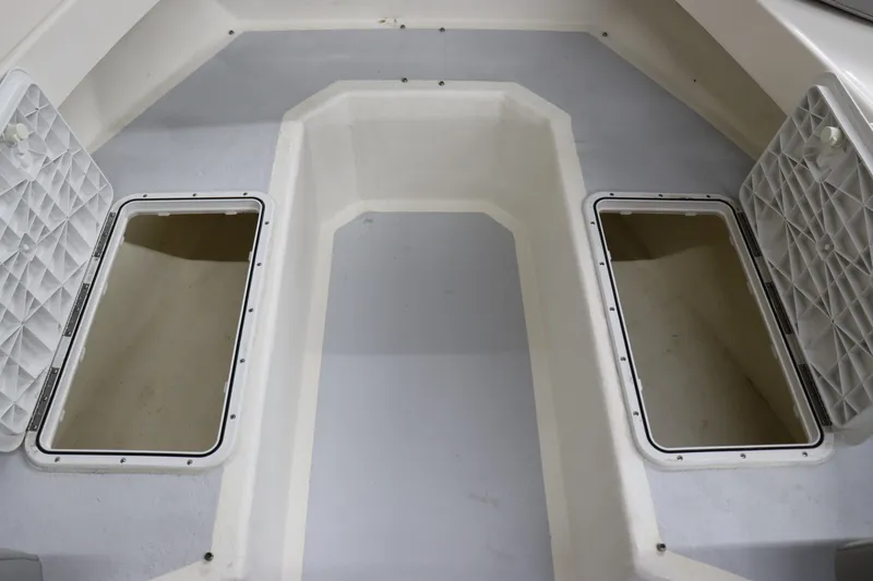 Slide: The Image of 2023 May-Craft 23 Cape Classic boat storage compartments. - 15