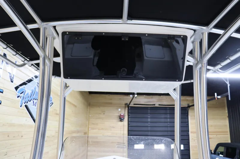 Slide: The Image of 2023 May-Craft 23 Cape Classic boat console with T-top in showroom. - 16