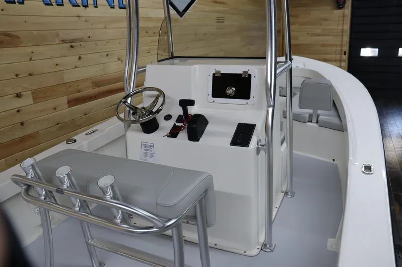 Slide: The Image of 2023 May-Craft 23 Cape Classic boat interior with console and seating. - 9
