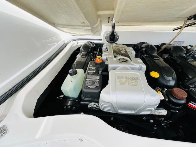 Slide: The Image of Cobalt 302 2015 model engine compartment with a V8 engine. - 31