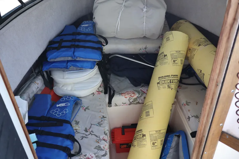 Slide: The Image of Interior of a Grady-White Adventure 208 boat with equipment. - 11