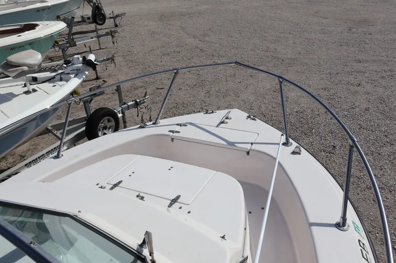 Slide: The Image of 1994 Grady-White Adventure 208 boat on a trailer. - 12