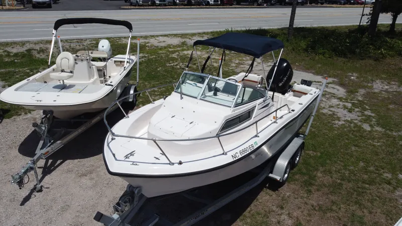 Slide: The Image of 1994 Grady-White Adventure 208 boat parked on trailer. - 2