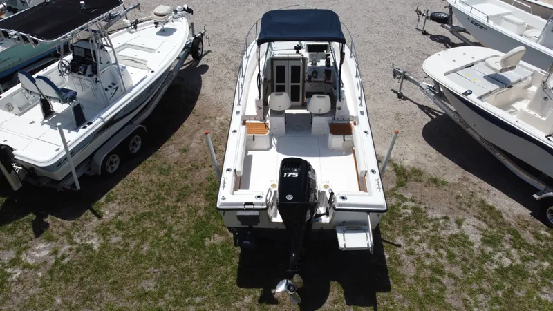 Slide: The Image of Aerial view of a 1994 Grady-White Adventure 208 boat in a parking lot. - 4
