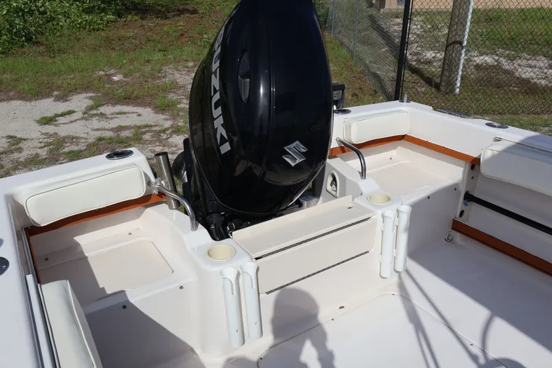 Slide: The Image of 1994 Grady-White Adventure 208 boat with Suzuki outboard motor. - 7