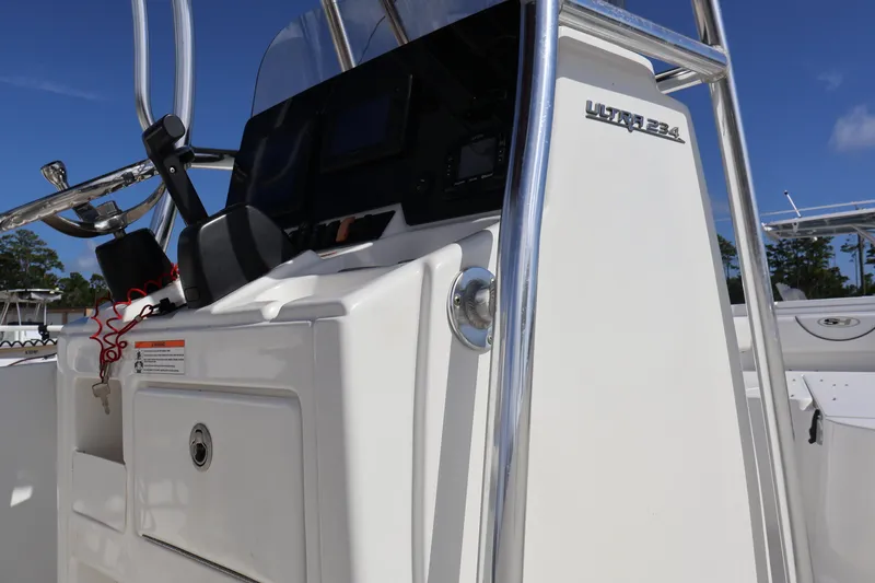 Slide: The Image of 2017 Sea Hunt 234 Ultra boat console and controls. - 10