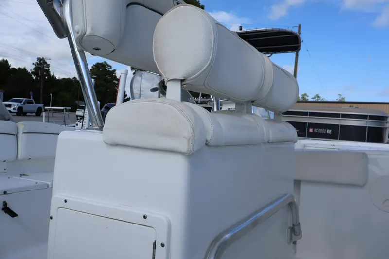 Slide: The Image of 2017 Sea Hunt 234 Ultra boat seating and console area. - 4