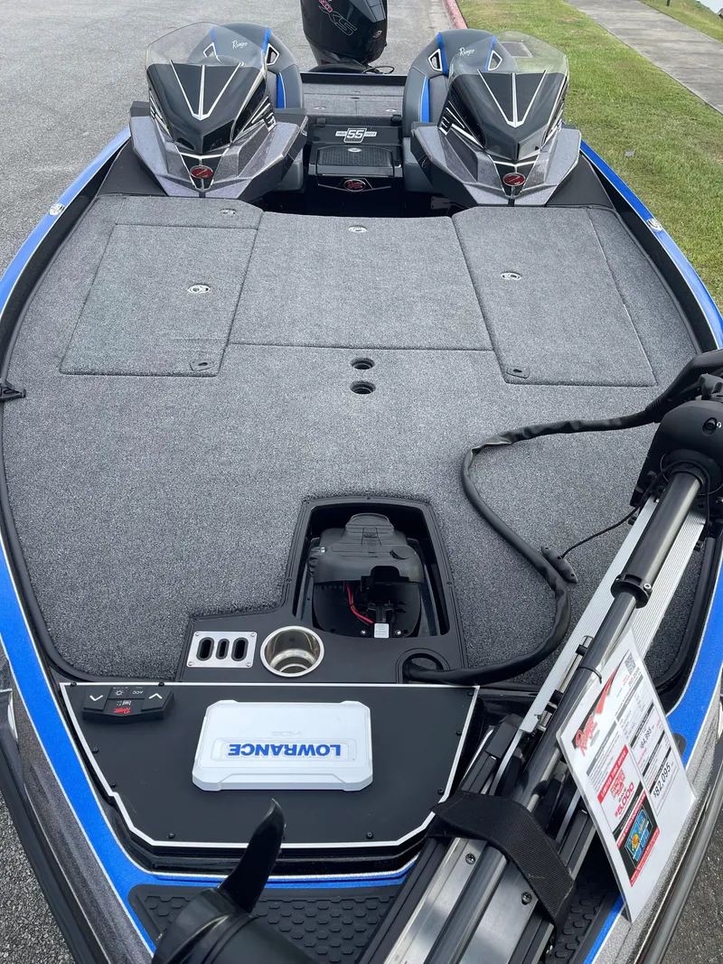 Slide: The Image of 2023 Ranger Z520R fishing boat with dual outboard motors and Lowrance electronics. - 2
