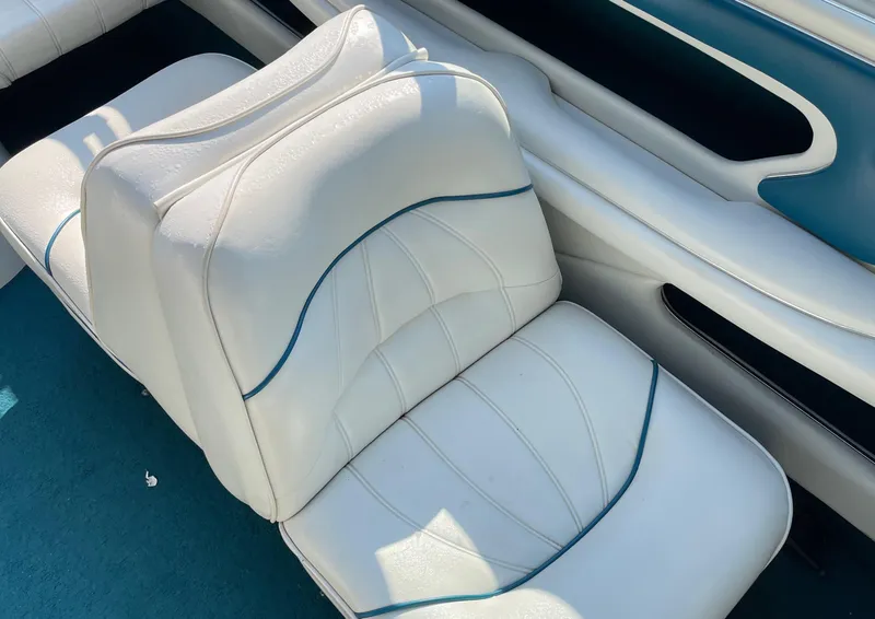 Slide: The Image of White leather seat in 1997 Sea Ray 190 SIGNATURE boat interior. - 16