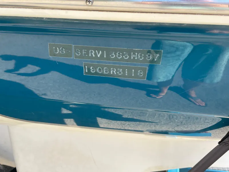 Slide: The Image of 1997 Sea Ray 190 SIGNATURE boat hull identification number close-up. - 23