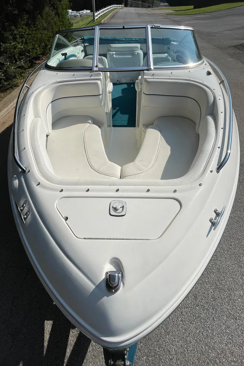 Slide: The Image of 1997 Sea Ray 190 Signature boat with white interior and sleek design. - 7