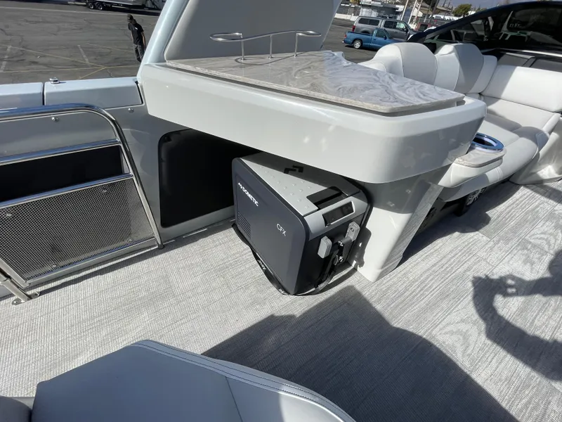 Slide: The Image of 2025 Avalon 2785 Excalibur Elite-Carbon Fiber interior with modern seating and sleek design. - 12
