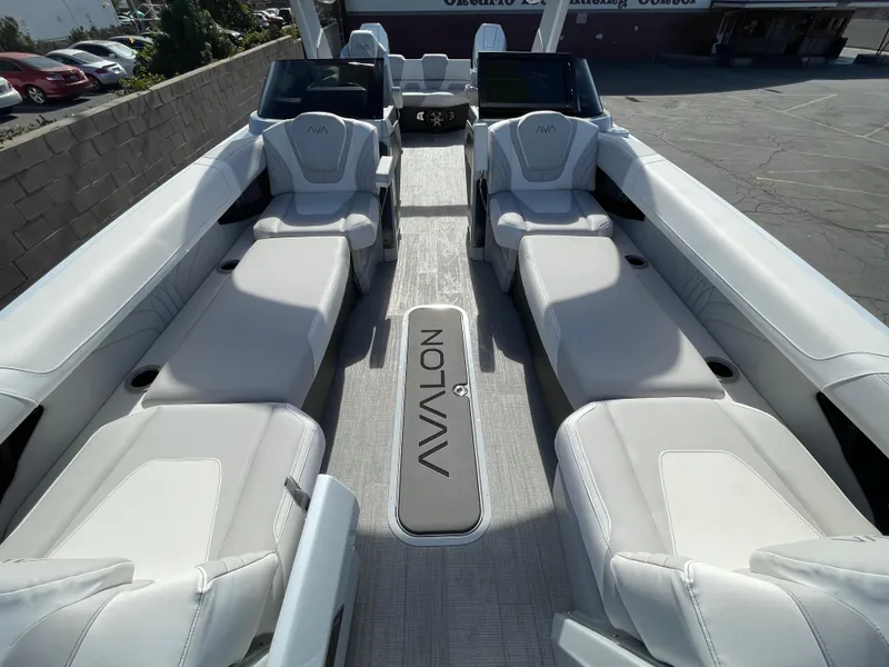 Slide: The Image of 2025 Avalon 2785 Excalibur Elite-Carbon Fiber luxury boat interior with sleek seating. - 7