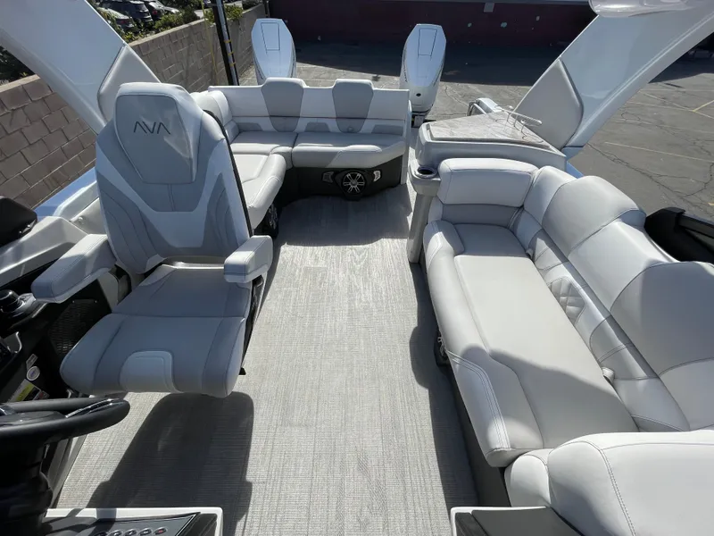 Slide: The Image of Luxurious interior of 2025 Avalon 2785 Excalibur Elite-Carbon Fiber boat with plush seating. - 8