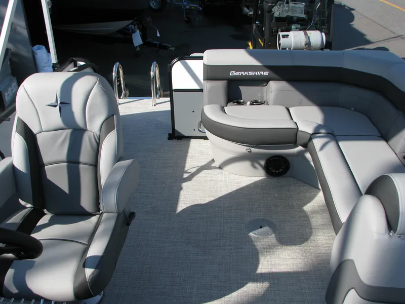 Slide: The Image of 2023 Berkshire 22CL2 CTS pontoon boat interior with gray seating and modern design. - 4