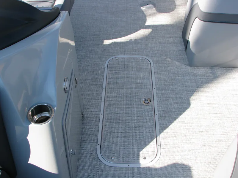 Slide: The Image of Interior deck of 2023 Berkshire 22CL2 CTS pontoon boat with storage hatch. - 5