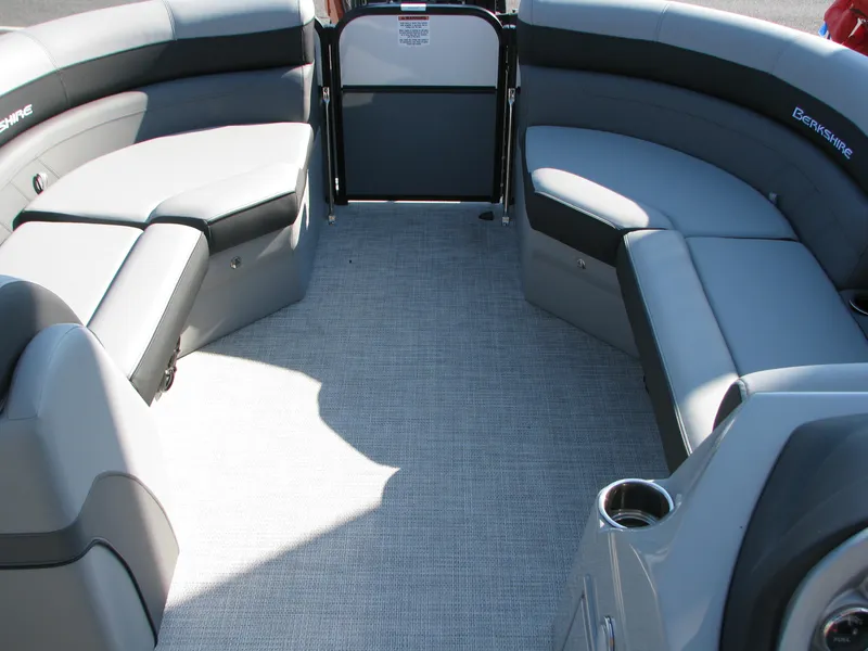 Slide: The Image of 2023 Berkshire 22CL2 CTS boat interior with gray seating and flooring. - 7